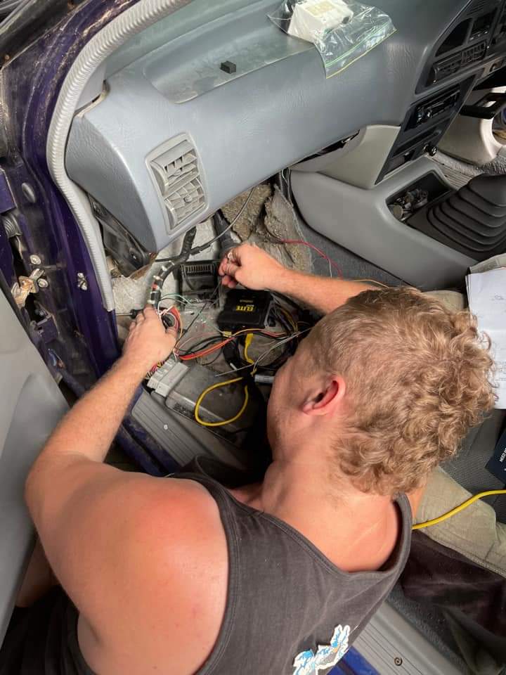 Wiring up behind the dash of a customer's car